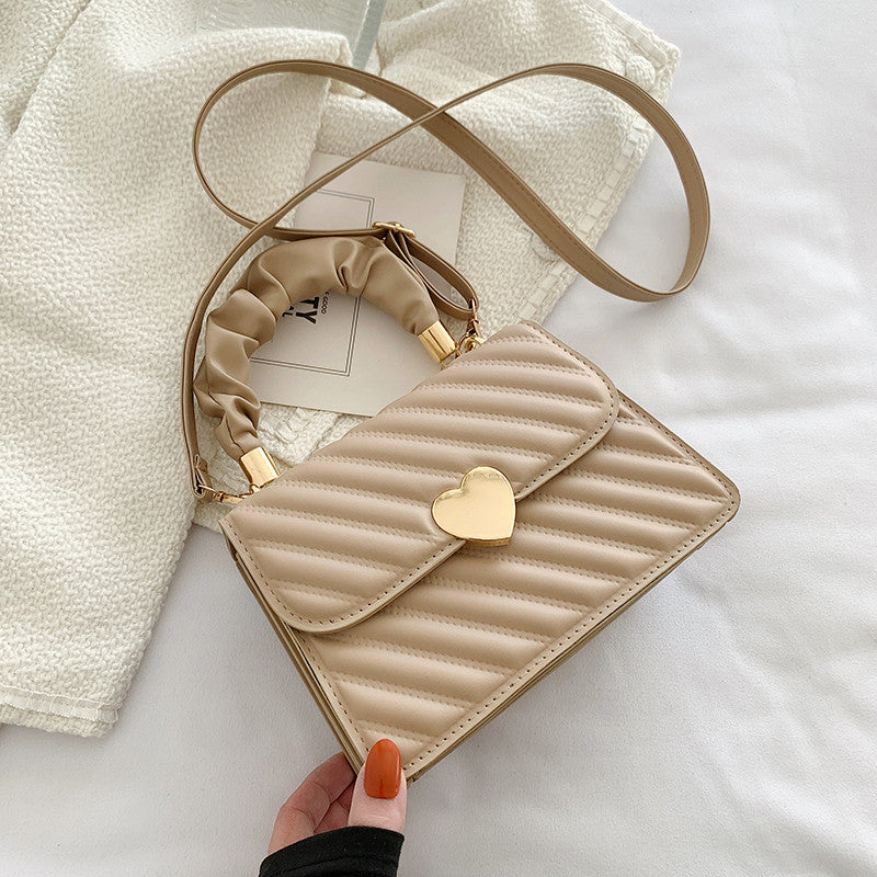 Elegante Handtasche mit Metal Design