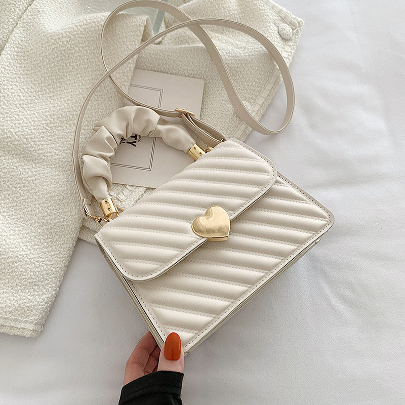Elegante Handtasche mit Metal Design