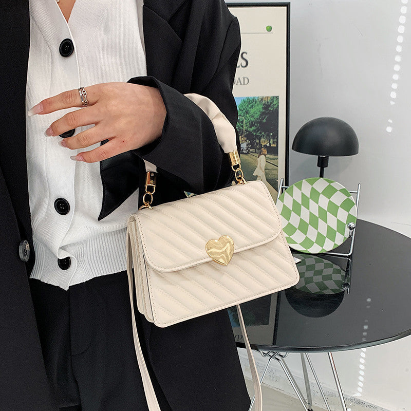 Elegante Handtasche mit Metal Design