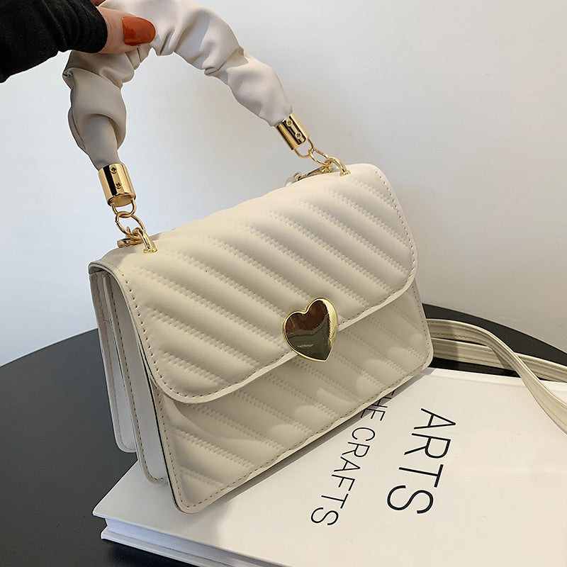 Elegante Handtasche mit Metal Design