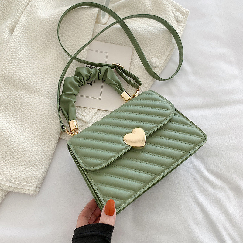 Elegante Handtasche mit Metal Design